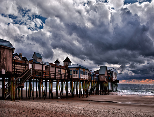Stormy skies above a pier